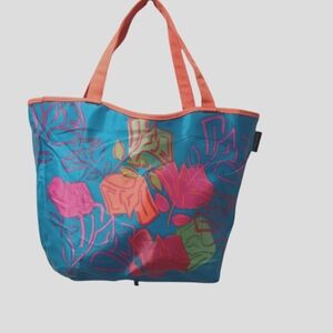 - REVERSIBLE VIBRANT LANCOME TOTE BAG